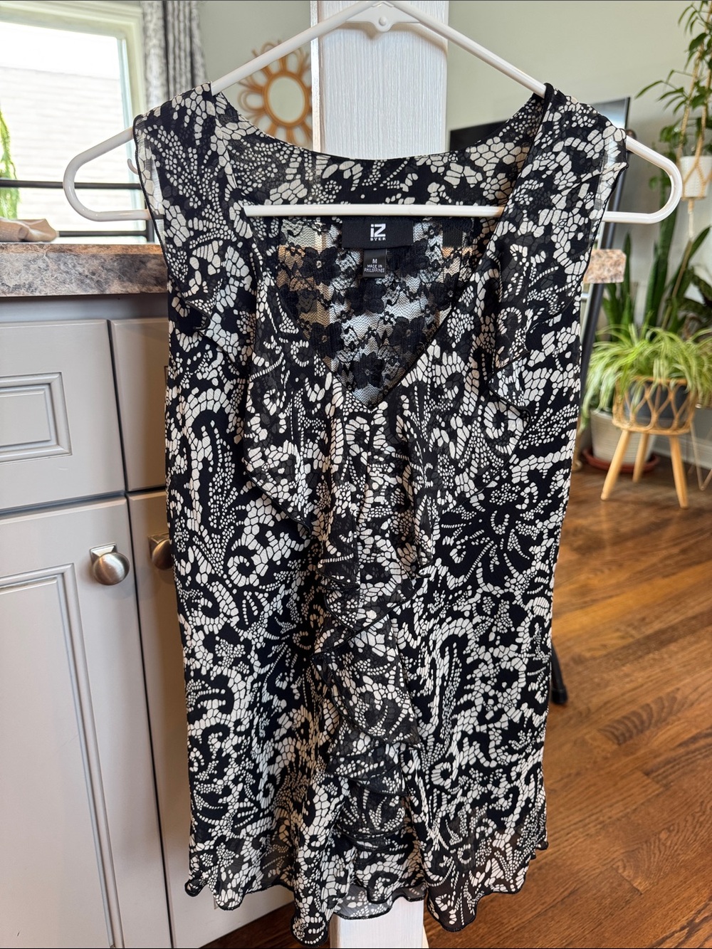Black & White Printed Ruffle Front Sleeveless Blouse